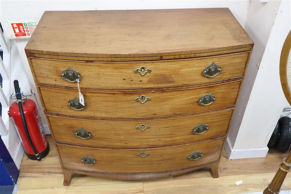 A Regency mahogany bowfront chest of four long drawers, width 101cm, depth 48cm, height 102cm